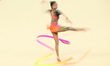 Izzah Binti Amzan of Malaysia with the ribbon during the Rhythmic Gymnastics Individual Al...