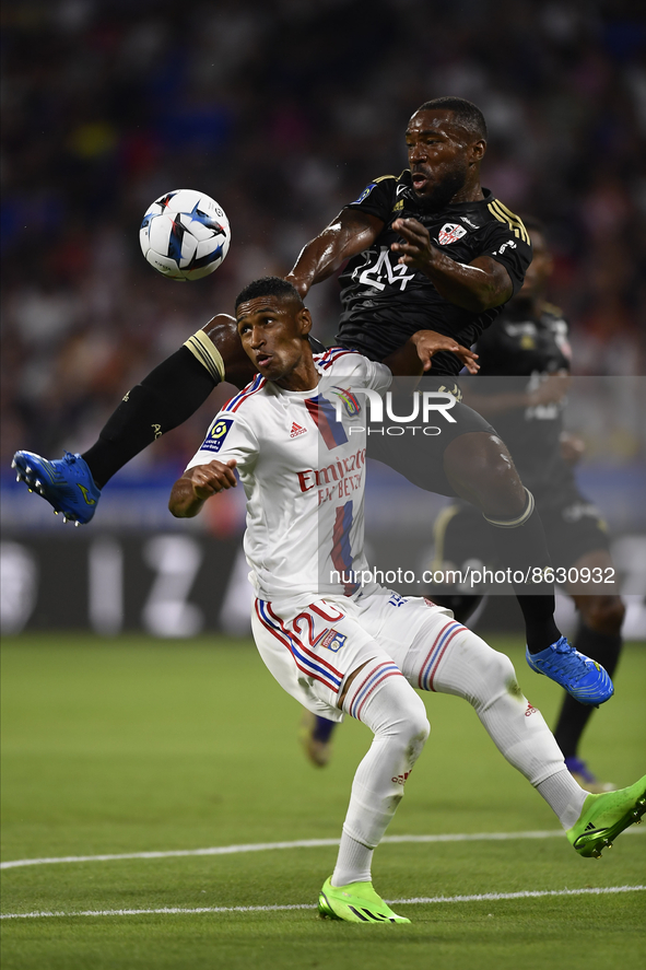 Tete of Olympique Lyonnais and Cedric Avinel of AC Ajaccio compete for the ball during the Ligue 1 match between Olympique Lyonnais and AC A...