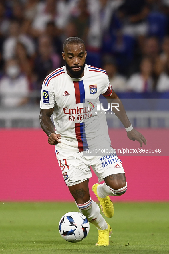 Alexandre Lacazette of Olympique Lyonnais runs with the ball during the Ligue 1 match between Olympique Lyonnais and AC Ajaccio at Groupama...