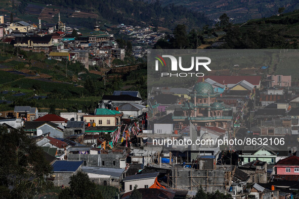 Village houses and mosques are seen in the Dieng mountain area in Banjarnegara, Central Java province, Indonesia, on August 6, 2022. 