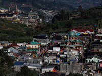 Village houses and mosques are seen in the Dieng mountain area in Banjarnegara, Central Java province, Indonesia, on August 6, 2022. (