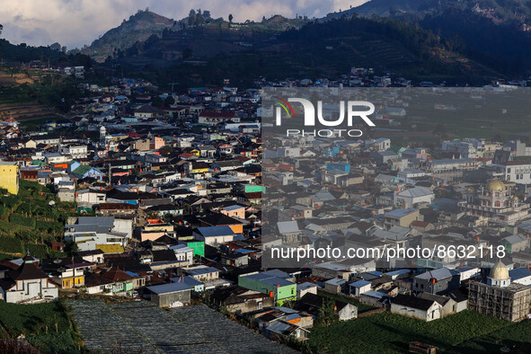 Village houses and mosques are seen in the Dieng mountain area in Banjarnegara, Central Java province, Indonesia, on August 6, 2022. 