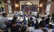 Iranian winners of Parkour Speed Run competition stand on winners podium in a shopping mal...