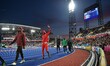 Zharnel Hughes of England salutes the crowd as the sun sets during the athletics at Alexan...