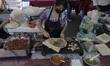 Sale of typical food at the Fair of Indigenous Cultures, Original Peoples and Neighbourhoo...