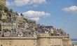 Mont-Saint-Michel tidal island with the magnificent medieval monastic buildings and the Ab...