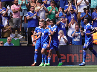 Timothy Castagne of Leicester City celebrates with teammates James Maddison and Wesley Fofana after scoring their teams first goal during th...