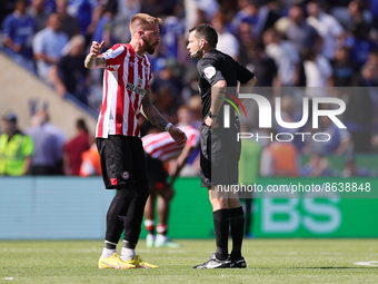 Pontus Jansson of Brentford interacts with Match referee, Jarred Gillett at the final whistle during the Premier League match between Leices...