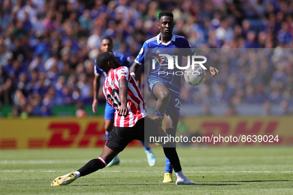 Wilfred Ndidi of Leicester City and Josh Dasilva of Brentford clash during the Premier League match between Leicester City and Brentford at...