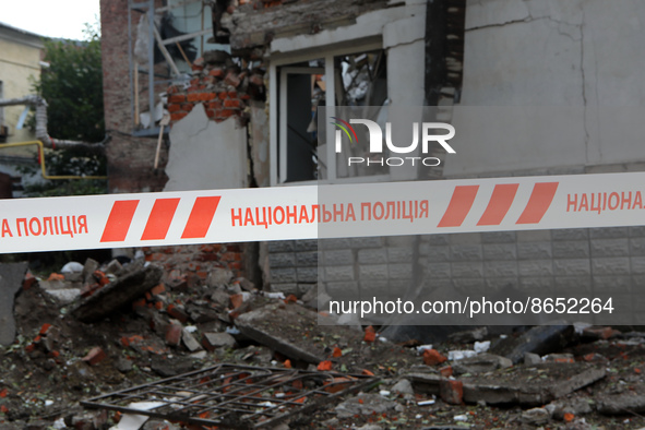 KHARKIV, UKRAINE - AUGUST 11, 2022 - The damage is pictured after a Russian shell hit a yard in a central residential area affecting an offi...