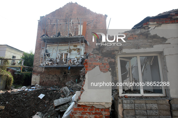KHARKIV, UKRAINE - AUGUST 11, 2022 - The damage is pictured after a Russian shell hit a yard in a central residential area affecting an offi...