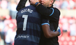 QPR Manager Michael Beale embraces QPR Goalkeeper Seny Dieng at full time during the Sky B...