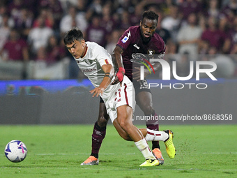Paulo Dybala of AS Roma and Lassana Coulibaly of US Salernitana 1919 compete for the ball during the Serie A match between US Salernitana 19...