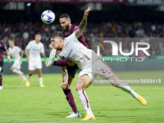 Nicolo' Zaniolo of AS Roma and Dylan Bronn of US Salernitana 1919 compete for the ball during the Serie A match between US Salernitana 1919...