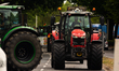a tractor is seen arriving during hundreds farmers tractors protest in front of Ministry o...