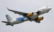 Airbus A320-232, from Vueling (Disneyland Paris Livery) company, taking off from the Barce...