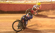 Dan Bewley (Great Britain) (Red) passes Rasmus Jensen (Denmark) (Yellow) during the FIM Sp...