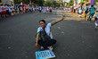 Nurses from state-run hospitals shout slogans during an anti-government demonstration to p...