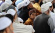 A boy listens to a cleric during an Islamic program in Sopore District Baramulla Jammu and...