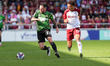 Doncaster Rovers Lee Tomlin is challenged by Northampton Town's Shaun McWilliams during th...