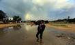 Rainbow appearance during rain on Gaza City, on October 27, 2015. 