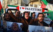 A Palestinian woman shouts slogans during demonstration supporting a new attempt to reconc...