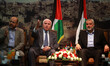 Senior Hamas leader Moussa Abu Marzouk (L) senior Fatah official Azzam Al-Ahmed (2nd L), h...
