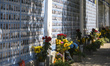 Flowers lay near the Memory Wall of the Fallen Defenders of Ukraine in the russian - Ukrai...