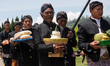 Dieng's religious leaders prepare the release offerings at Bale Kambang Lake in Central Ja...