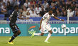 Karl TOKO EKAMBI of Lyon and Birama TOURE of Auxerre during the French championship Ligue...