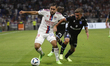 Rayan CHERKI of Lyon and Mathias AUTRET of Auxerre during the French championship Ligue 1...