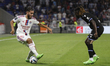 Rayan CHERKI of Lyon and Gideon MENSAH of Auxerre during the French championship Ligue 1 f...