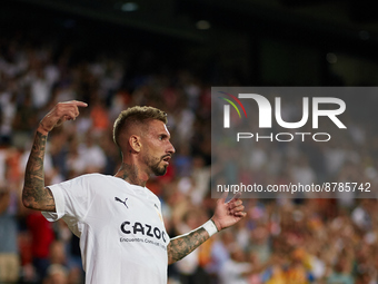 Samu Castillejo of Valencia CF celebrates after scoring their side's third goal during the LaLiga Santander match between Valencia CF and Ge...