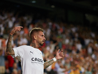 Samu Castillejo of Valencia CF celebrates after scoring their side's third goal during the LaLiga Santander match between Valencia CF and Ge...