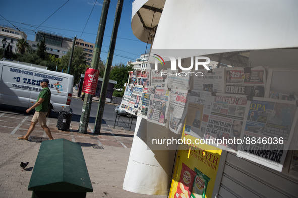 Newspapers are hanging on a kiosk in the center of Athens, Greece on September 14, 2022. 