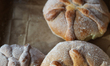 'Pan de muerto' or bread of the dead for sale during the Day of the Dead celebrations in T...