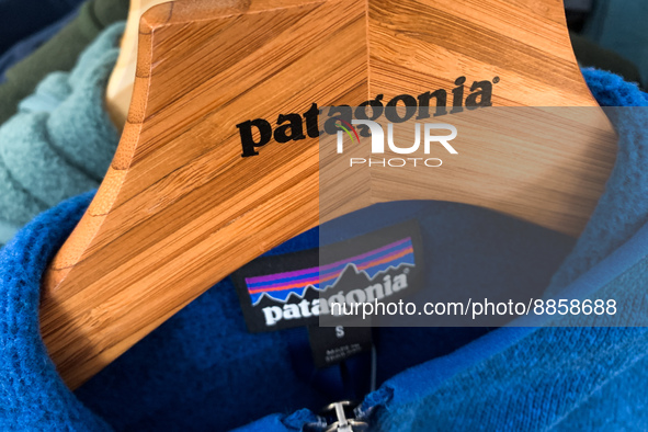 Patagonia logos are seen on a hanger and on a sweater in the store in Krakow, Poland on September 16, 2022. 