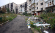 IZIUM, UKRAINE - SEPTEMBER 15, 2022 - An apartment building destroyed as a result of Russi...
