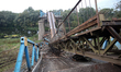 IZIUM, UKRAINE - SEPTEMBER 15, 2022 - A destroyed bridge across the Siverskyi Donets River...