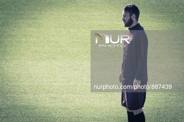 Daniele De Rossi, AS Roma's players warm up during a training session, on the eve of the team's Champions League football match against Baye...