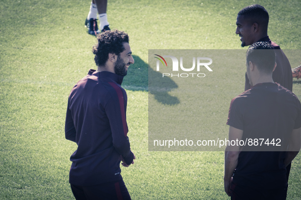 Salah, AS Roma's player, warm up during a training session, on the eve of the team's Champions League football match against Bayer Leverkuse...