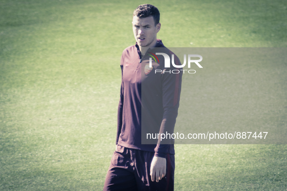Edin Dzeko, AS Roma's player, warm up during a training session, on the eve of the team's Champions League football match against Bayer Leve...