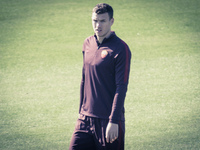 Edin Dzeko, AS Roma's player, warm up during a training session, on the eve of the team's Champions League football match against Bayer Leve...