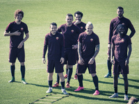 AS Roma's players warm up during a training session, on the eve of the team's Champions League football match against Bayer Leverkusen
 , at...
