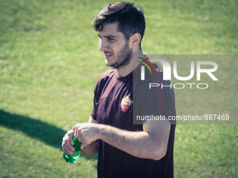 Manolas, AS Roma's player, warm up during a training session, on the eve of the team's Champions League football match against Bayer Leverku...