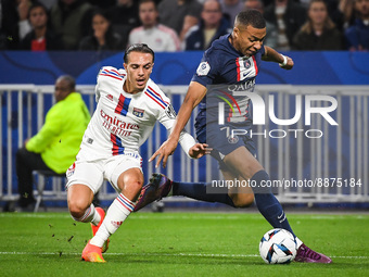 Maxence CAQUERET of Lyon and Kylian MBAPPE of PSG during the French championship Ligue 1 football match between Olympique Lyonnais and Paris...