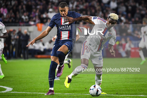 Kylian MBAPPE of PSG and Thiago MENDES of Lyon during the French championship Ligue 1 football match between Olympique Lyonnais and Paris Sa...