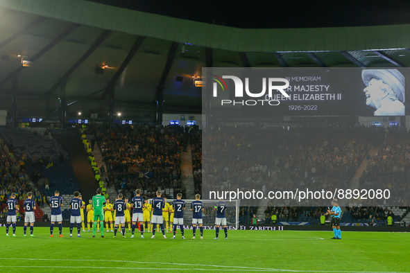Both sides pay their respects during a minutes applause ahead the UEFA Nations League match between Scotland and Ukraine at Hampden Park, Gl...