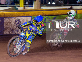 Kyle Howarth  (Blue) leads Charles Wright  (White) during the SGB Premiership match between Sheffield Tigers and Belle Vue Aces at Owlerton...
