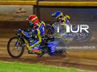 Adam Ellis  (Red) and Kyle Howarth  (Blue) go for maximum points during the SGB Premiership match between SheffieldTigers and Belle Vue Aces...